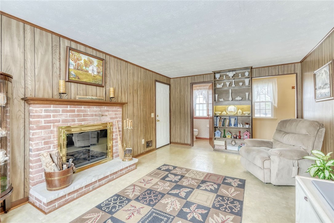 6930 Lakeside Road Ontario, NY 14519 - Photo 16 of 40 Family Room with Wood Burning Fireplace