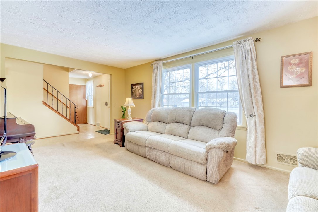 6930 Lakeside Road Ontario, NY 14519 - Photo 4 of 40 Living Room with New Windows and HARDWOOD FLOORS u