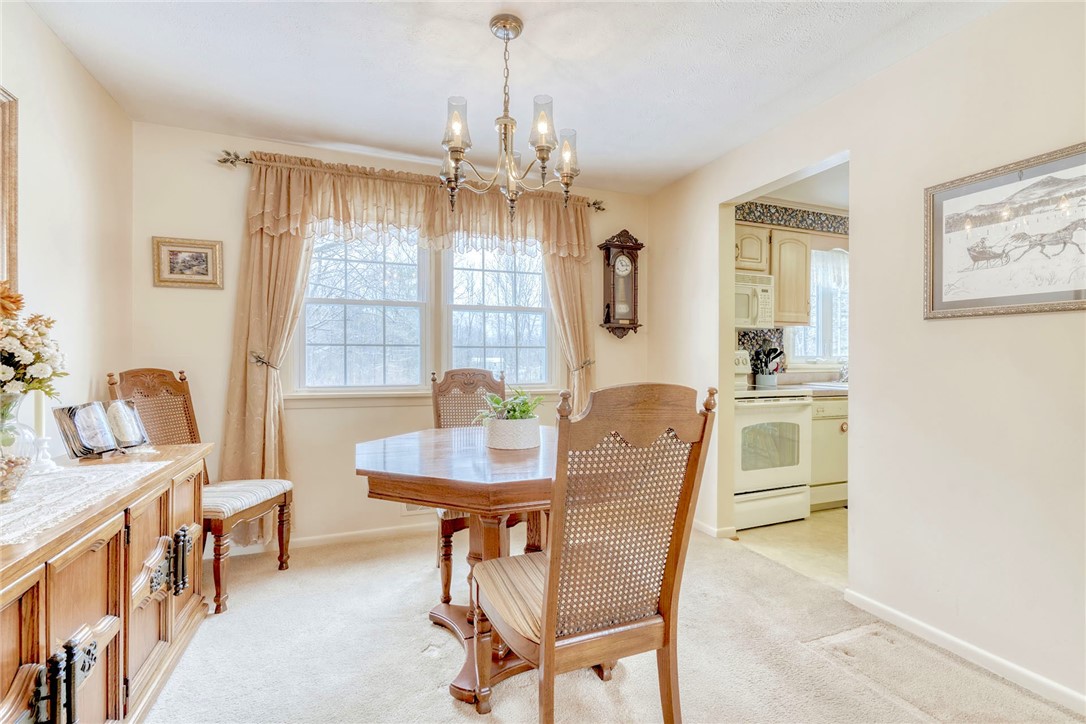 6930 Lakeside Road Ontario, NY 14519 - Photo 8 of 40 Dining Room with New Windows and HARDWOOD FLOORS u