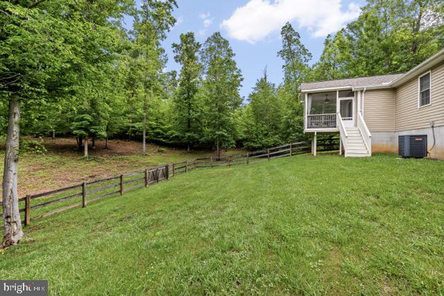 30367 Old Locust Grove Locust Grove, VA 22508 - Photo 33 of 36 a view of a backyard with a garden and entertaining space