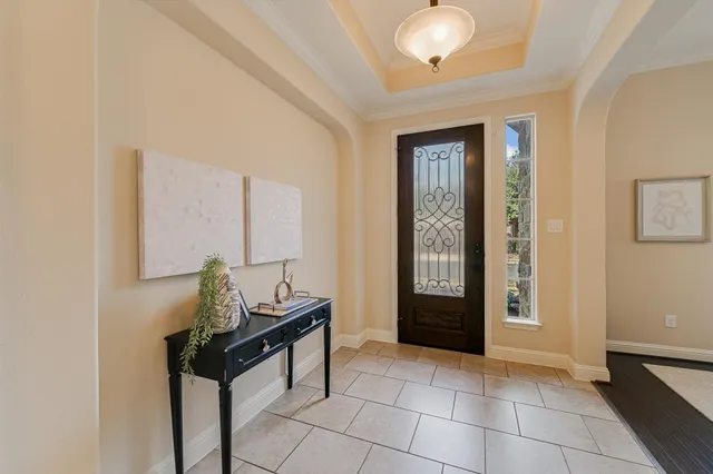 a view of a hallway with front door