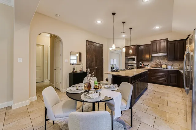 a view of a dining room with furniture