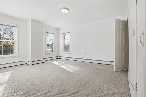 an empty room with windows