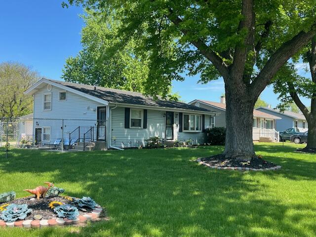 1417 Earl Road Michigan City, IN 46360 - Photo 3 of 25 a front view of house with yard and green space
