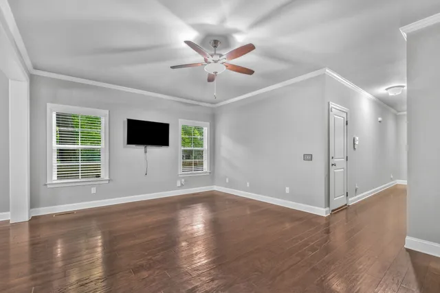 a view of kitchen with a sink appliances and living room