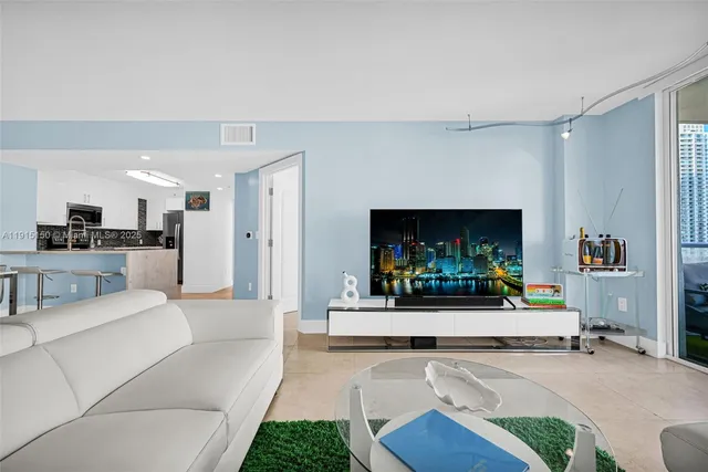 a view of house with swimming pool outdoor seating