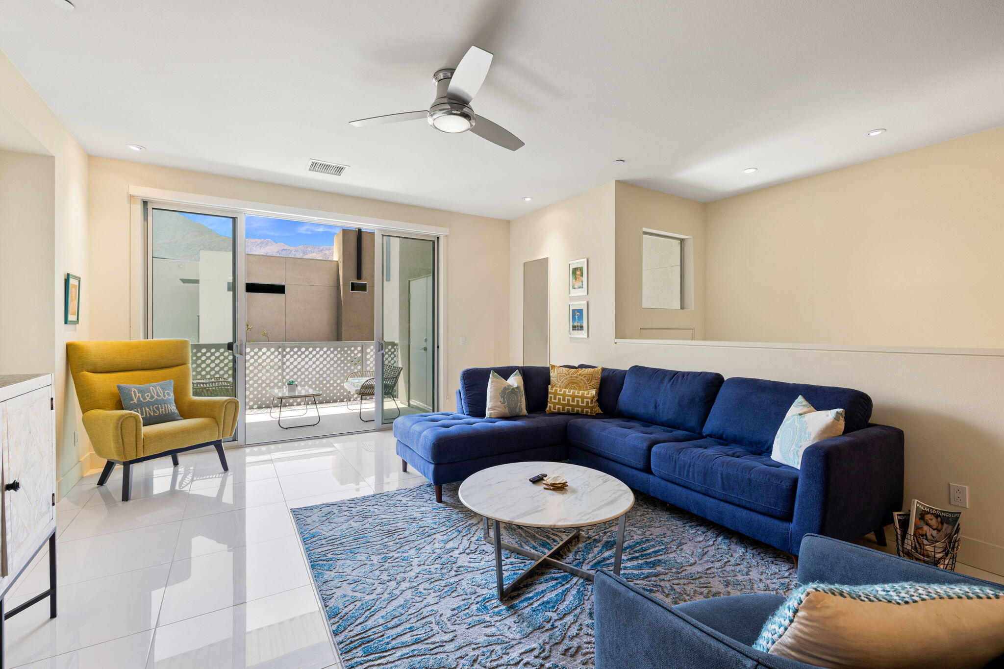 191 The River Palm Springs, CA 92262 - Photo 22 of 39 a living room with furniture and a couch