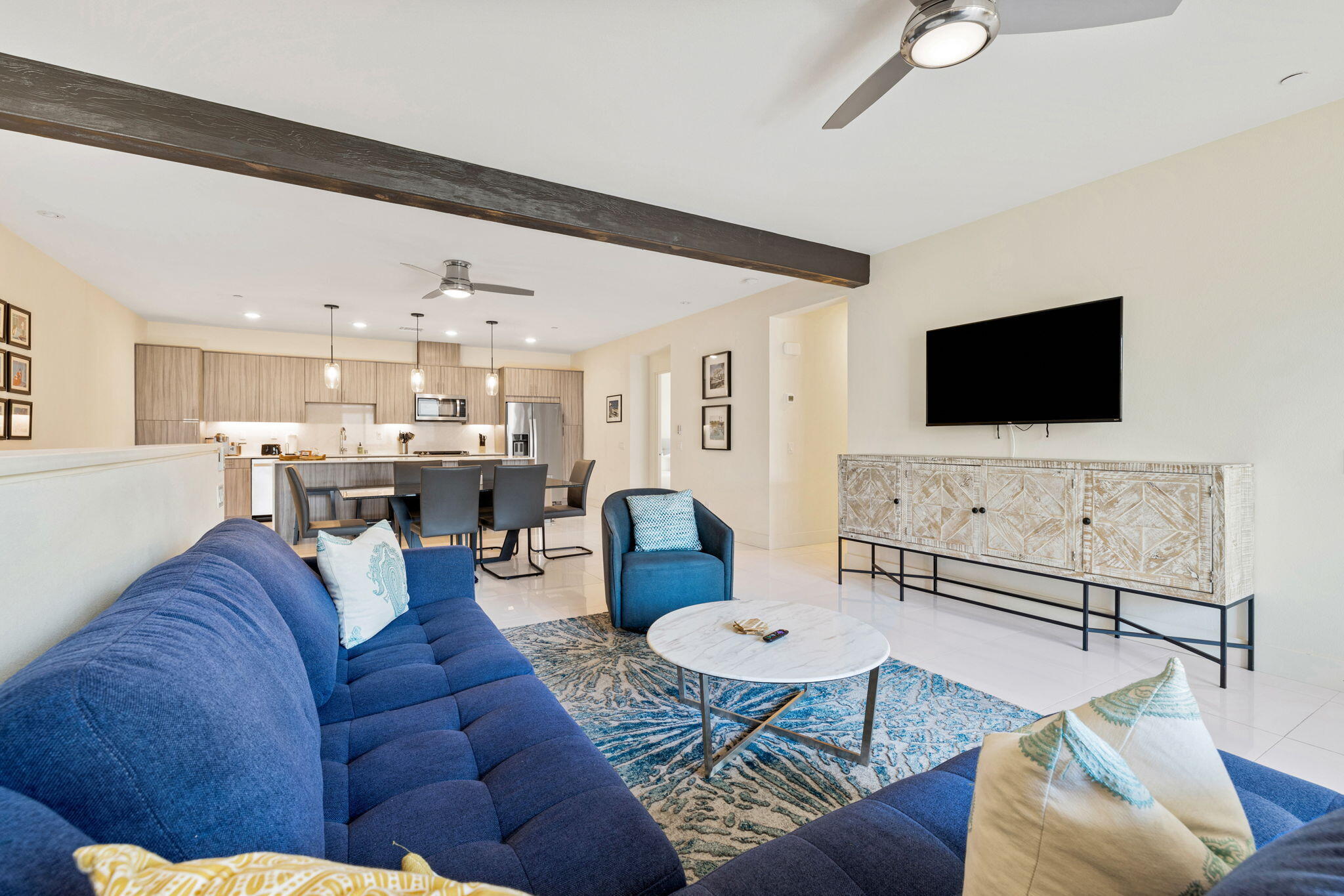 191 The River Palm Springs, CA 92262 - Photo 25 of 39 a living room with furniture and a flat screen tv