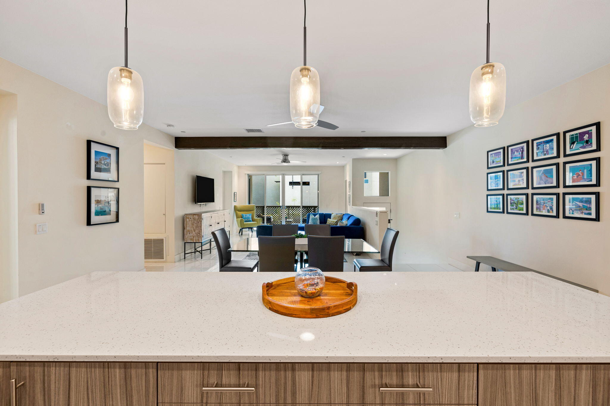 191 The River Palm Springs, CA 92262 - Photo 8 of 39 a kitchen with stainless steel appliances a table and chairs