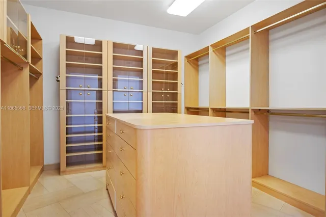 a bathroom with a sink a tub and a shower