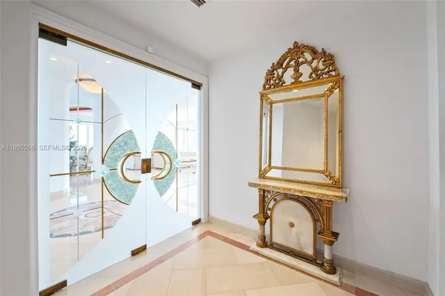 a bathroom with a granite countertop toilet sink and mirror
