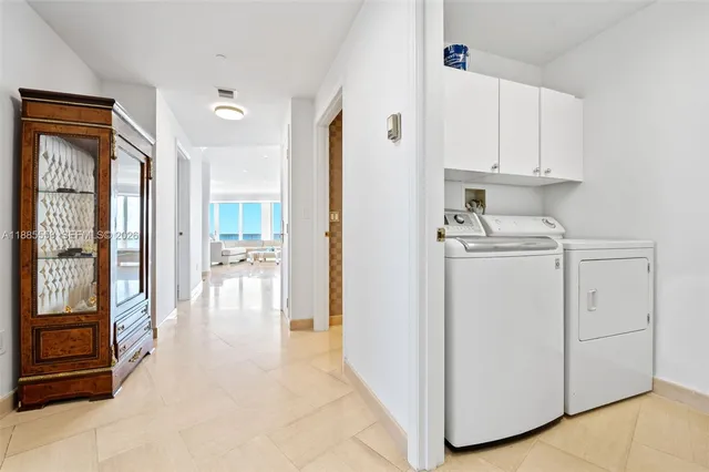 a bathroom with a sink toilet and a mirror