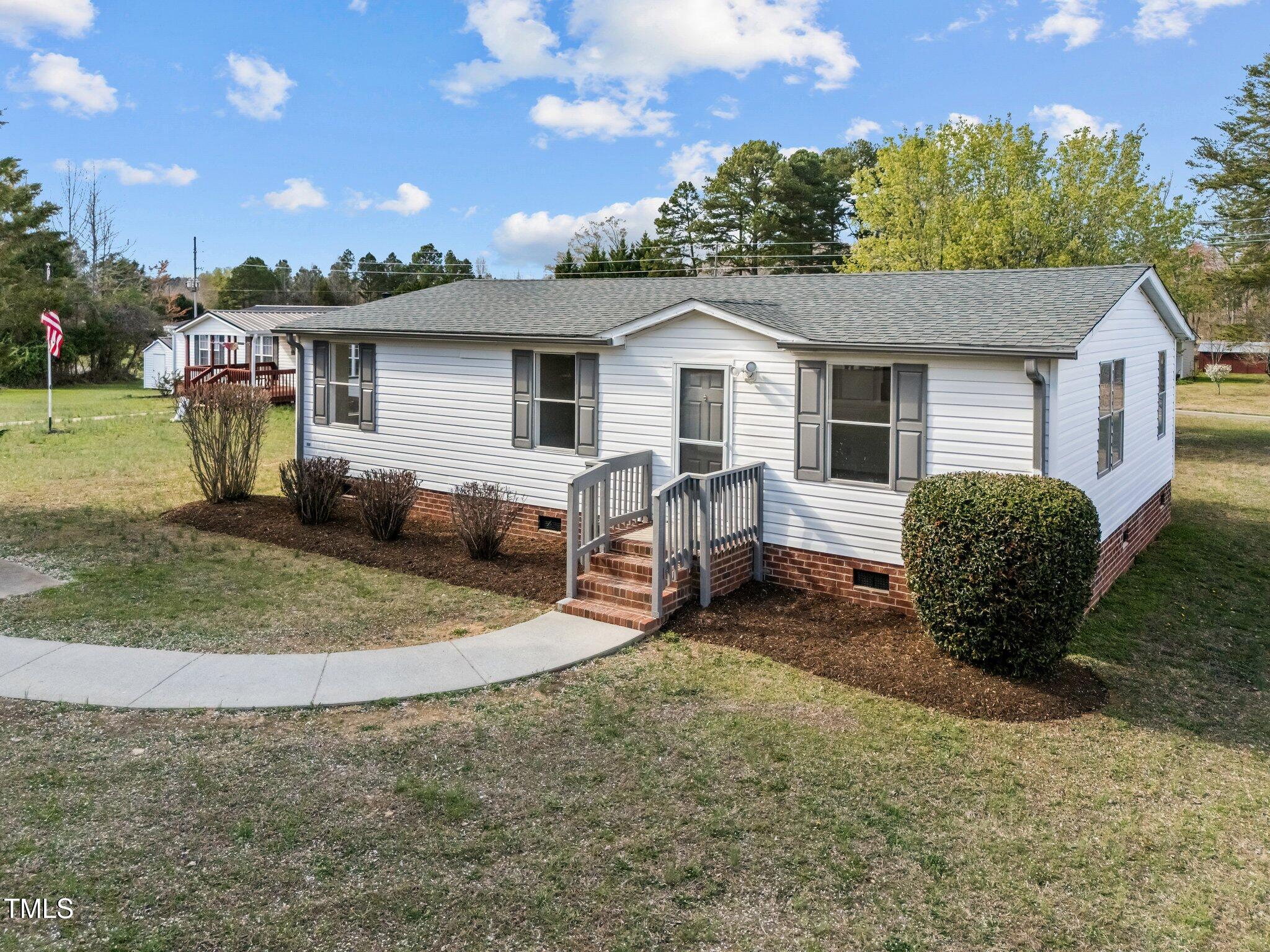 78 Primrose Lane Roxboro, NC 27573 - Photo 3 of 18 3-web-or-mls-DJI_20250325162404_0041_D