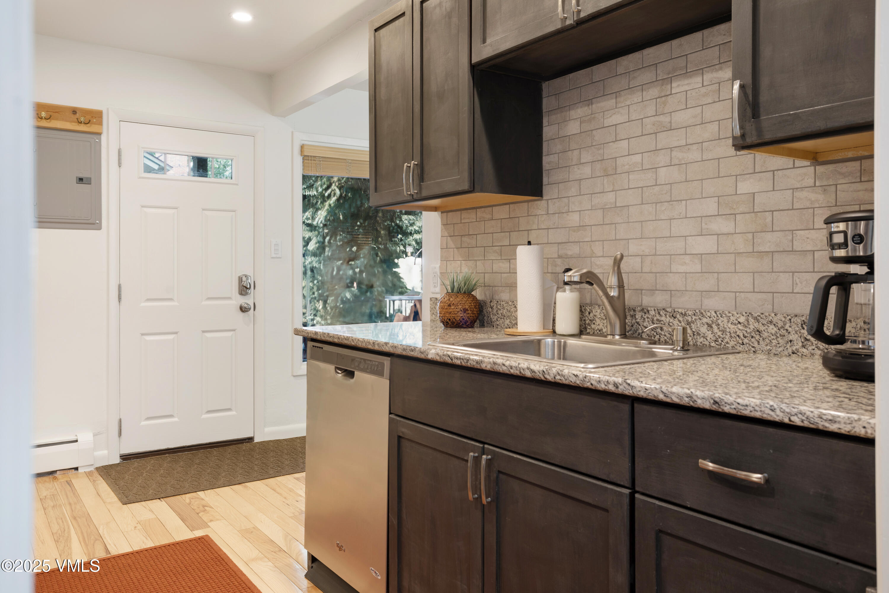 909 Red Sandstone Road, Unit B2 Vail, CO 81657 - Photo 14 of 24 a kitchen with sink and cabinets