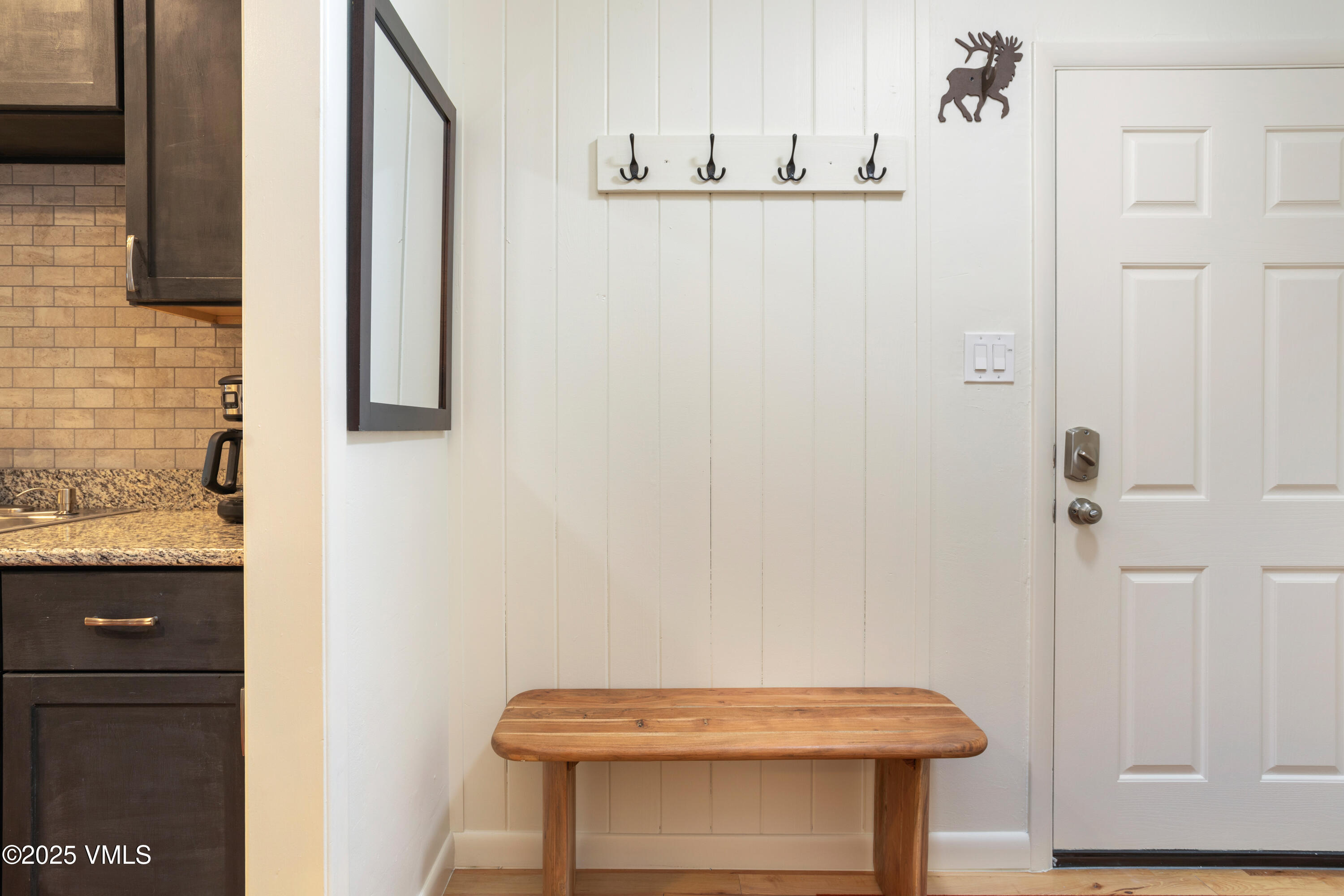 909 Red Sandstone Road, Unit B2 Vail, CO 81657 - Photo 19 of 24 a bathroom with a sink and a mirror
