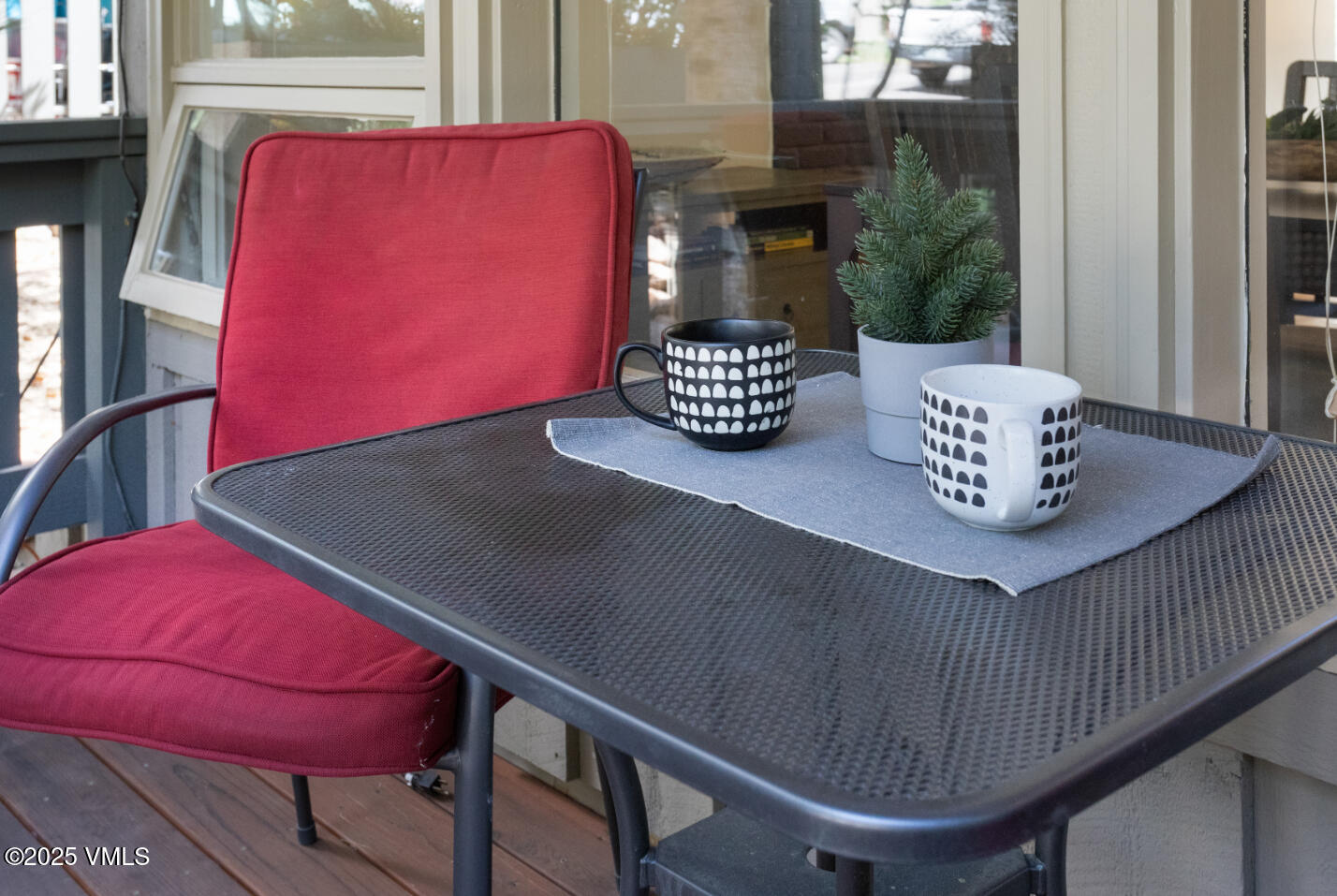 909 Red Sandstone Road, Unit B2 Vail, CO 81657 - Photo 22 of 24 a table chair sitting next to a couch