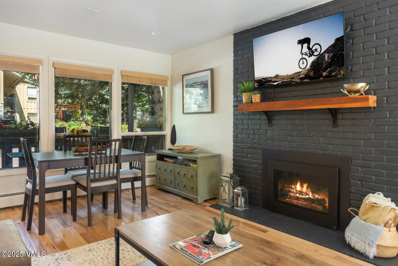 909 Red Sandstone Road, Unit B2 Vail, CO 81657 - Photo 4 of 24 a living room with furniture and a fireplace