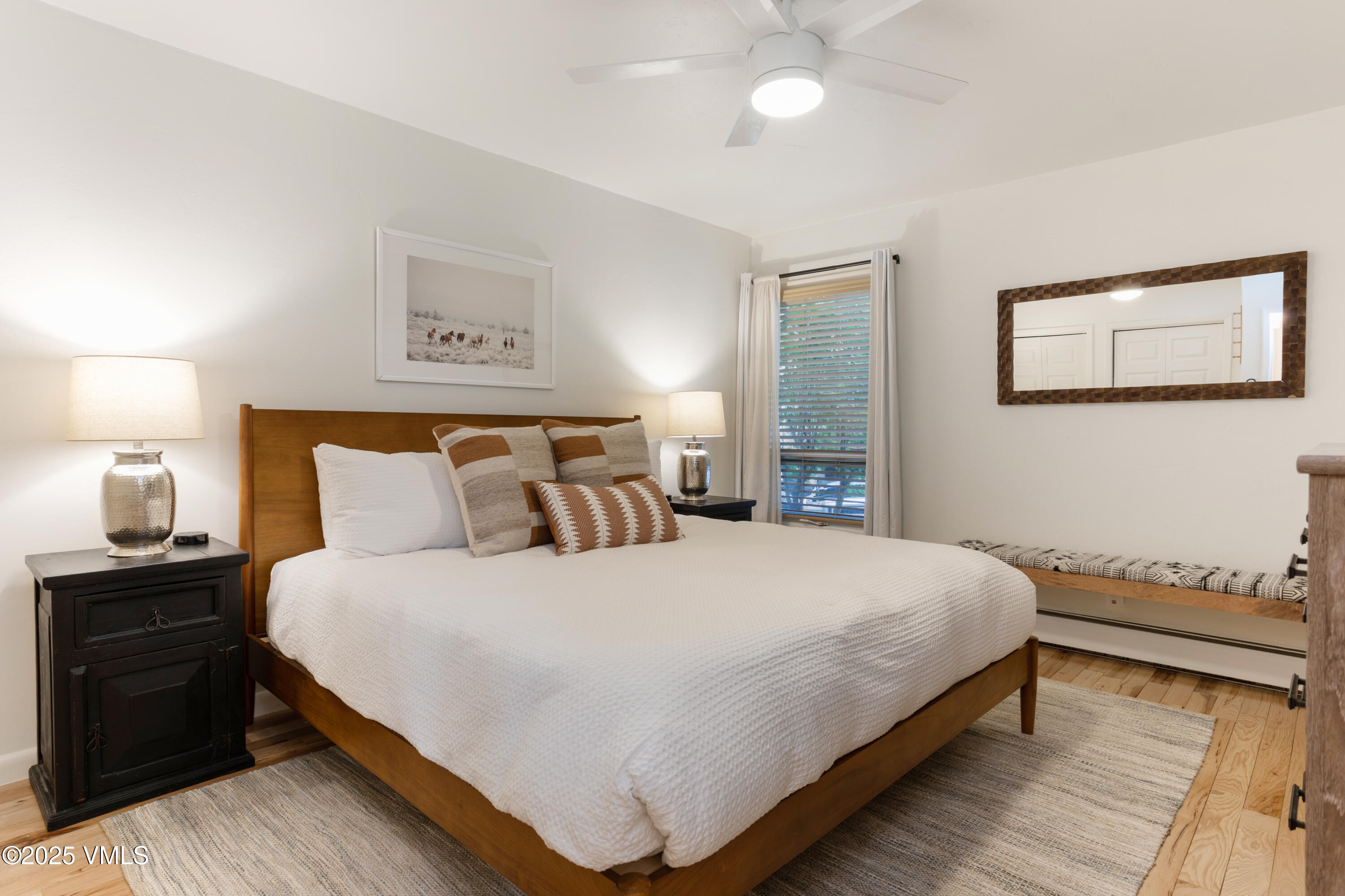 909 Red Sandstone Road, Unit B2 Vail, CO 81657 - Photo 5 of 24 a bedroom with bed and window