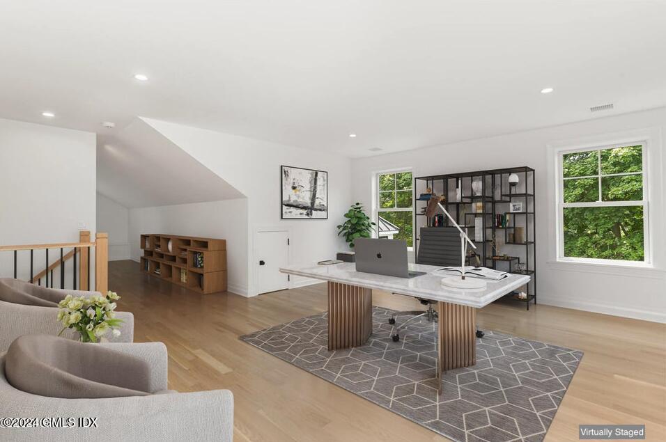 97 Lockwood Road Riverside, CT 06878 - Photo 32 of 59 a living room with furniture and a table