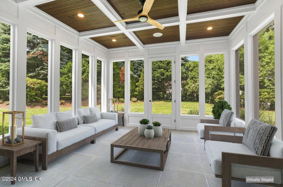 97 Lockwood Road Riverside, CT 06878 - Photo 36 of 59 a living room with furniture and floor to ceiling windows