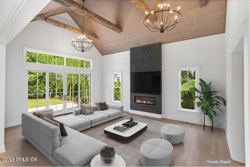 97 Lockwood Road Riverside, CT 06878 - Photo 6 of 59 a living room with furniture and a flat screen tv