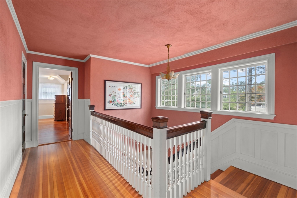 570 Washington Street Dedham, MA 02026 - Photo 23 of 37 a view of a room with wooden floor and balcony