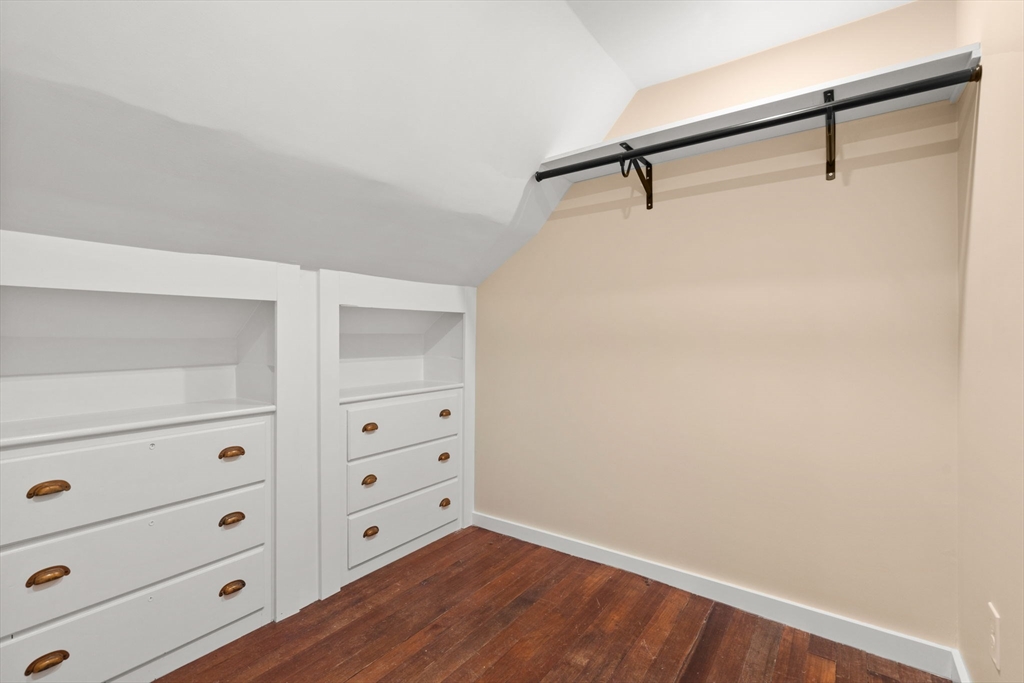 570 Washington Street Dedham, MA 02026 - Photo 29 of 37 a view of an empty walk in closet