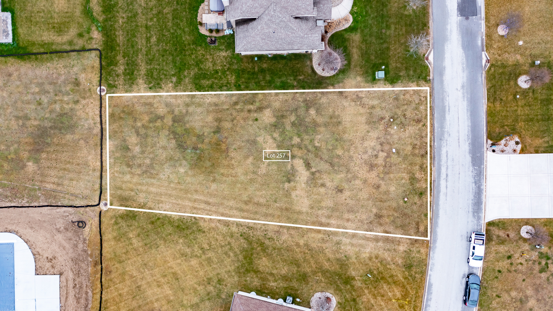 9110 Doubletree Drive South Winfield, IN 46307 - Photo 9 of 31 an aerial view of residential house with parking space