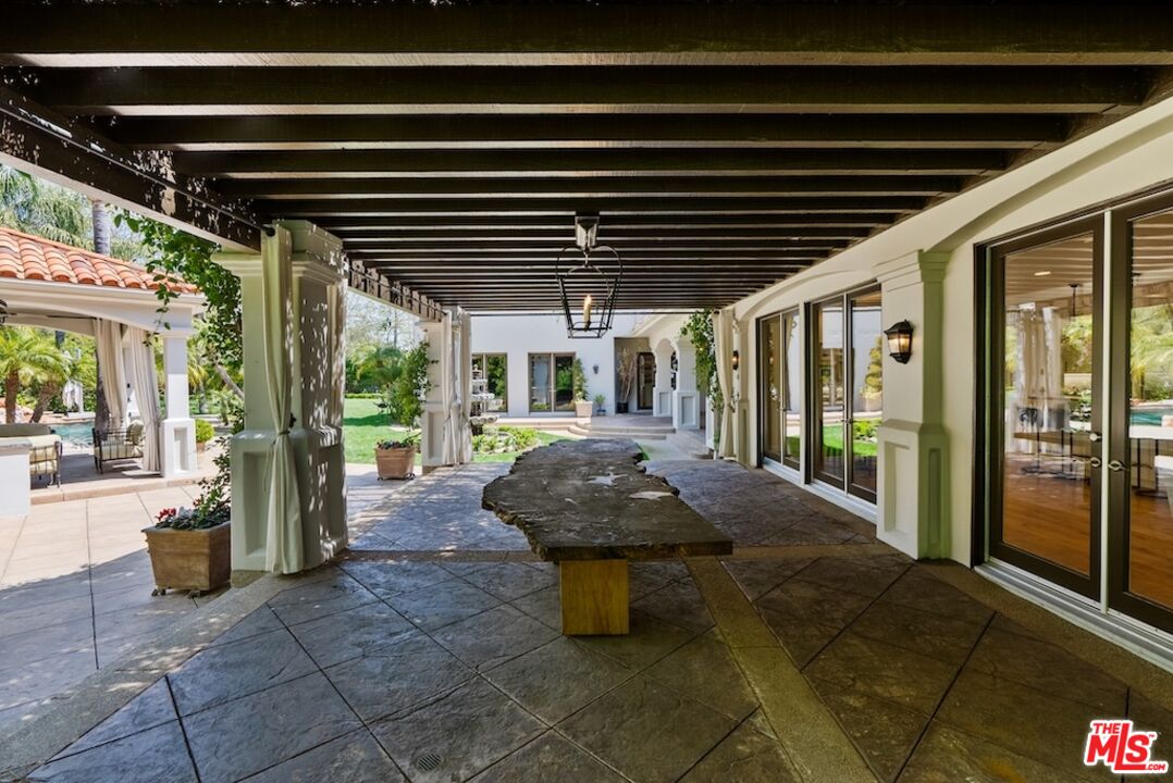 23593 Parksouth Street Calabasas, CA 91302 - Photo 64 of 75 a room with pool table and outdoor seating