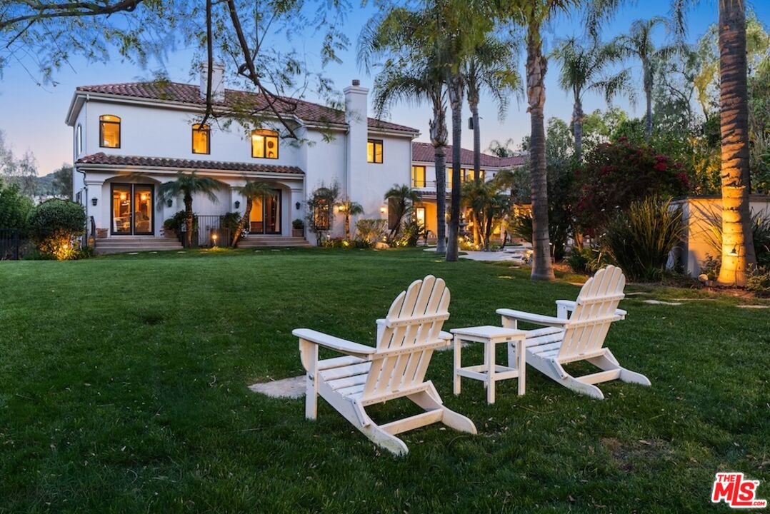 23593 Parksouth Street Calabasas, CA 91302 - Photo 75 of 75 a view of a chair and tables in the big yard
