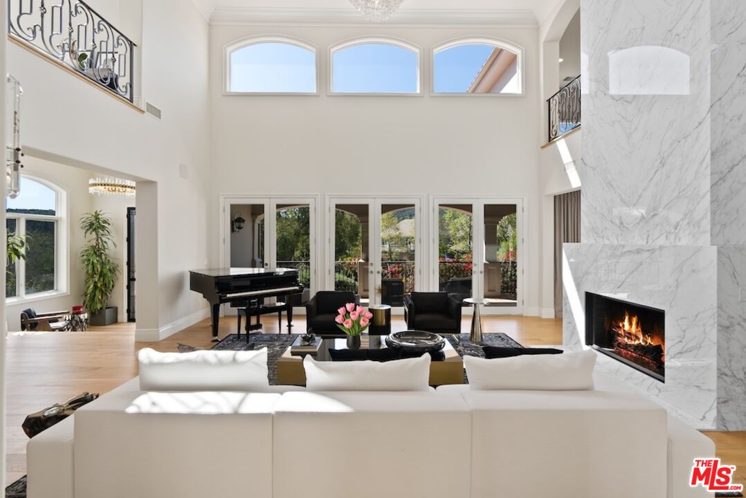 23593 Parksouth Street Calabasas, CA 91302 - Photo 10 of 75 a living room with furniture and fireplace