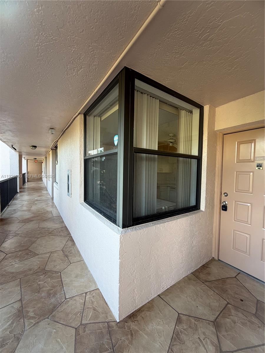 10360 Northwest 30th Court, Unit 204 Sunrise, FL 33322 - Photo 11 of 24 a view of a car garage