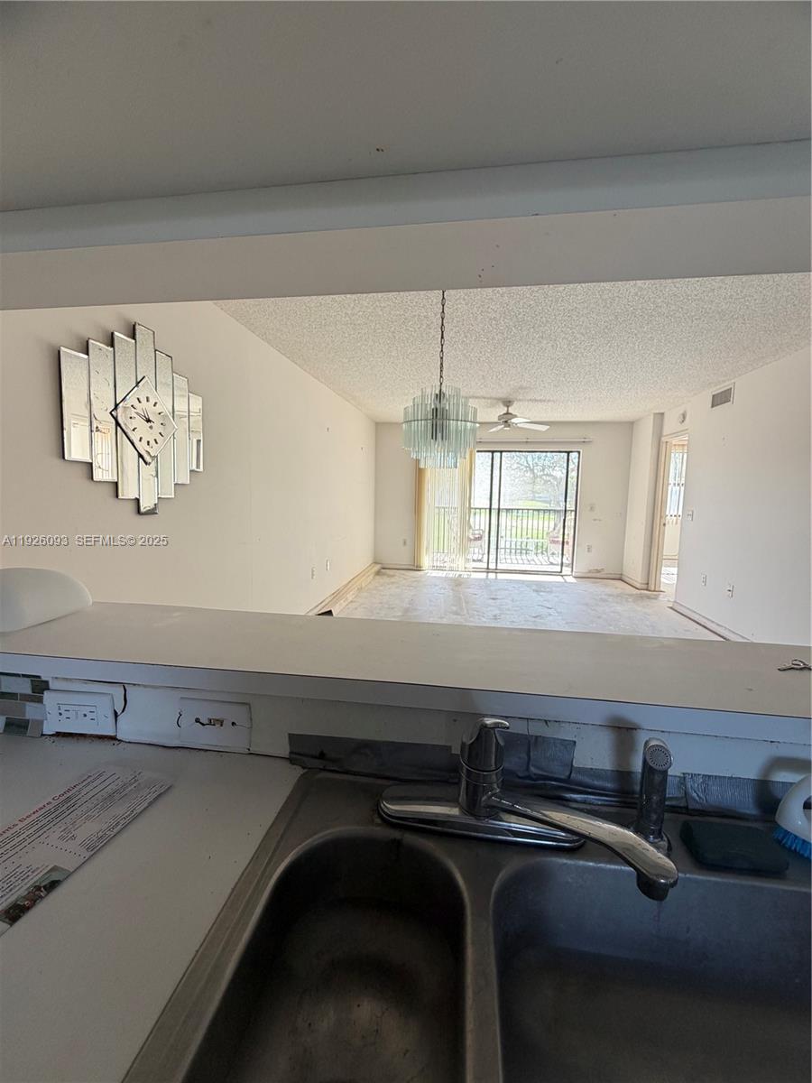 10360 Northwest 30th Court, Unit 204 Sunrise, FL 33322 - Photo 13 of 24 a view of a room with gym equipment