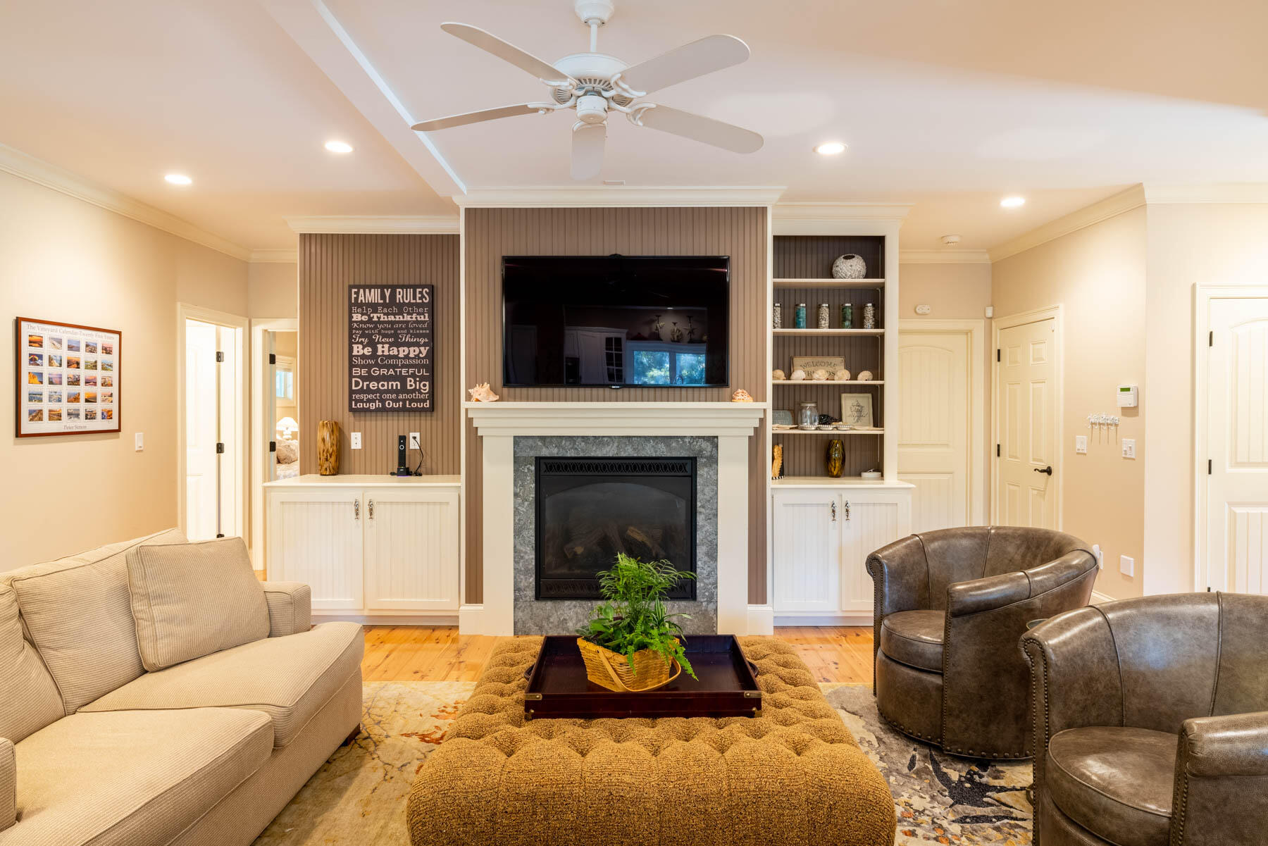 94 Marthas Road Edgartown, MA 02539 - Photo 8 of 36 a living room with furniture and a fireplace