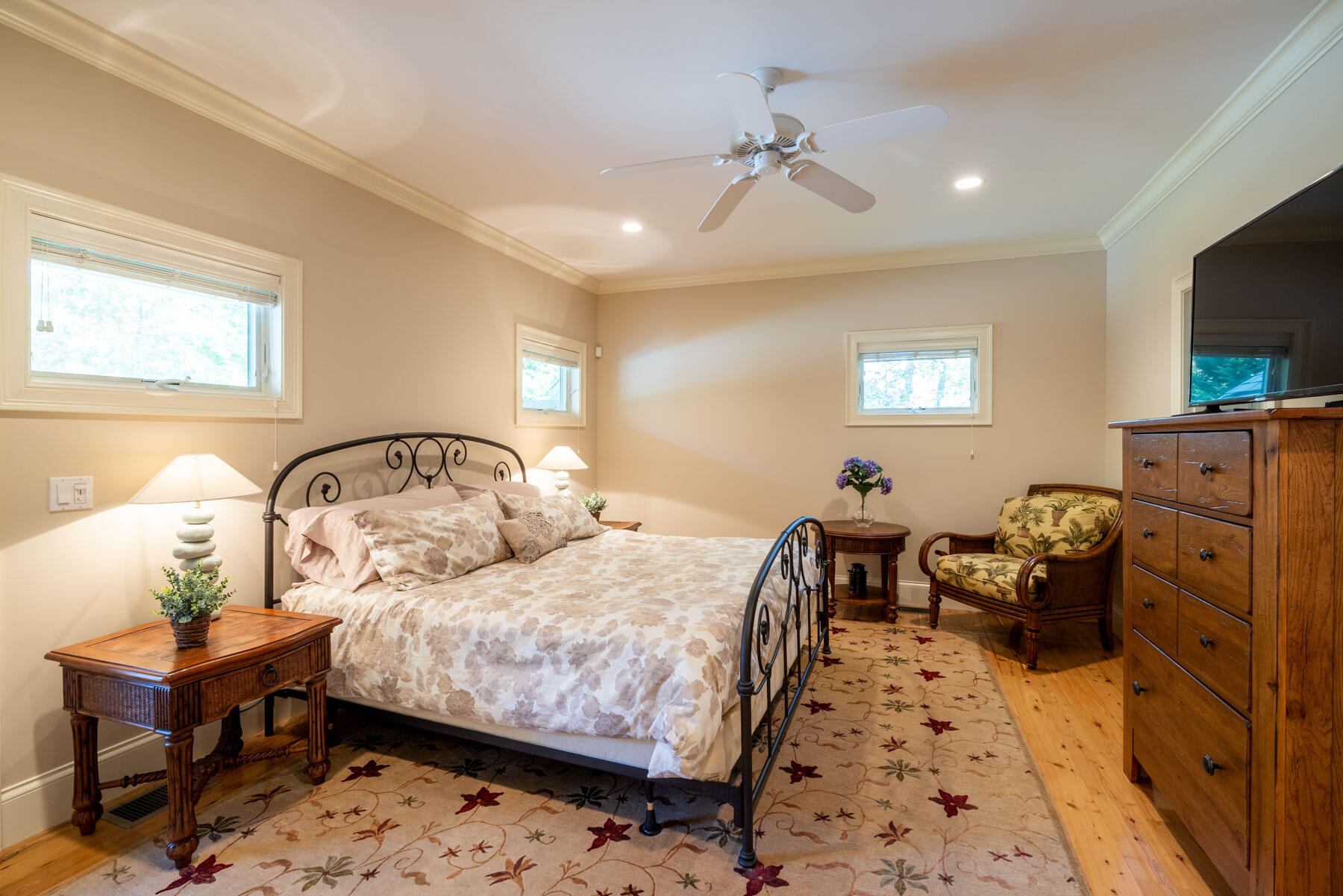 94 Marthas Road Edgartown, MA 02539 - Photo 10 of 36 a bedroom with furniture and a flat screen tv