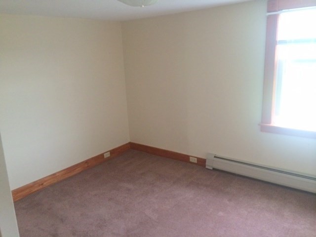 421 North East Street Amherst, MA 01002 - Photo 7 of 7 a view of an empty room and a window