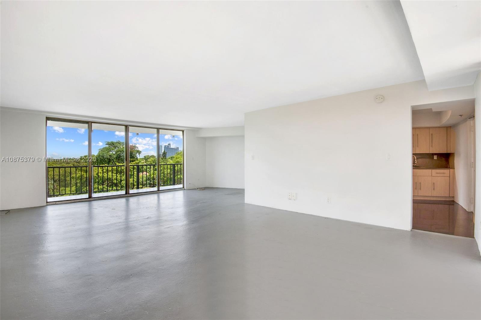 Morningside Miami, FL 33137 - Photo 5 of 27 a view of an empty room with a window
