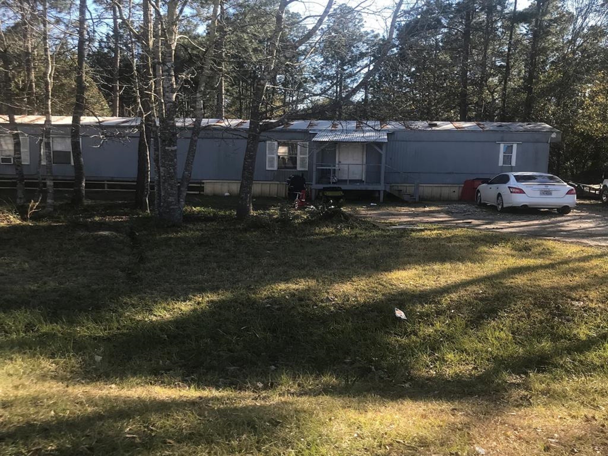 19282 Amy Lane Porter, TX 77365 - Photo 3 of 11 a view of a house with a yard