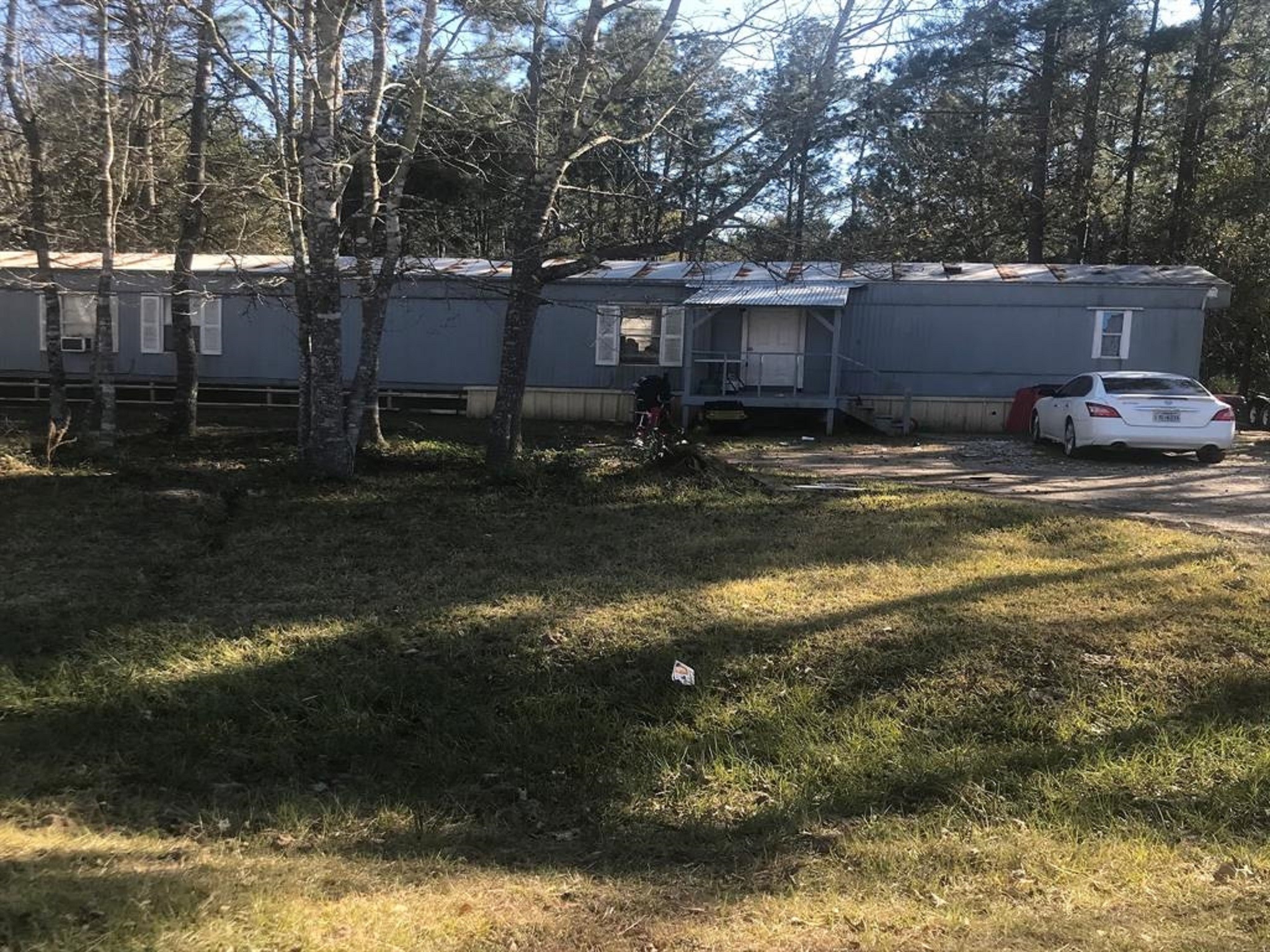 19282 Amy Lane Porter, TX 77365 - Photo 7 of 11 a view of a house with a yard
