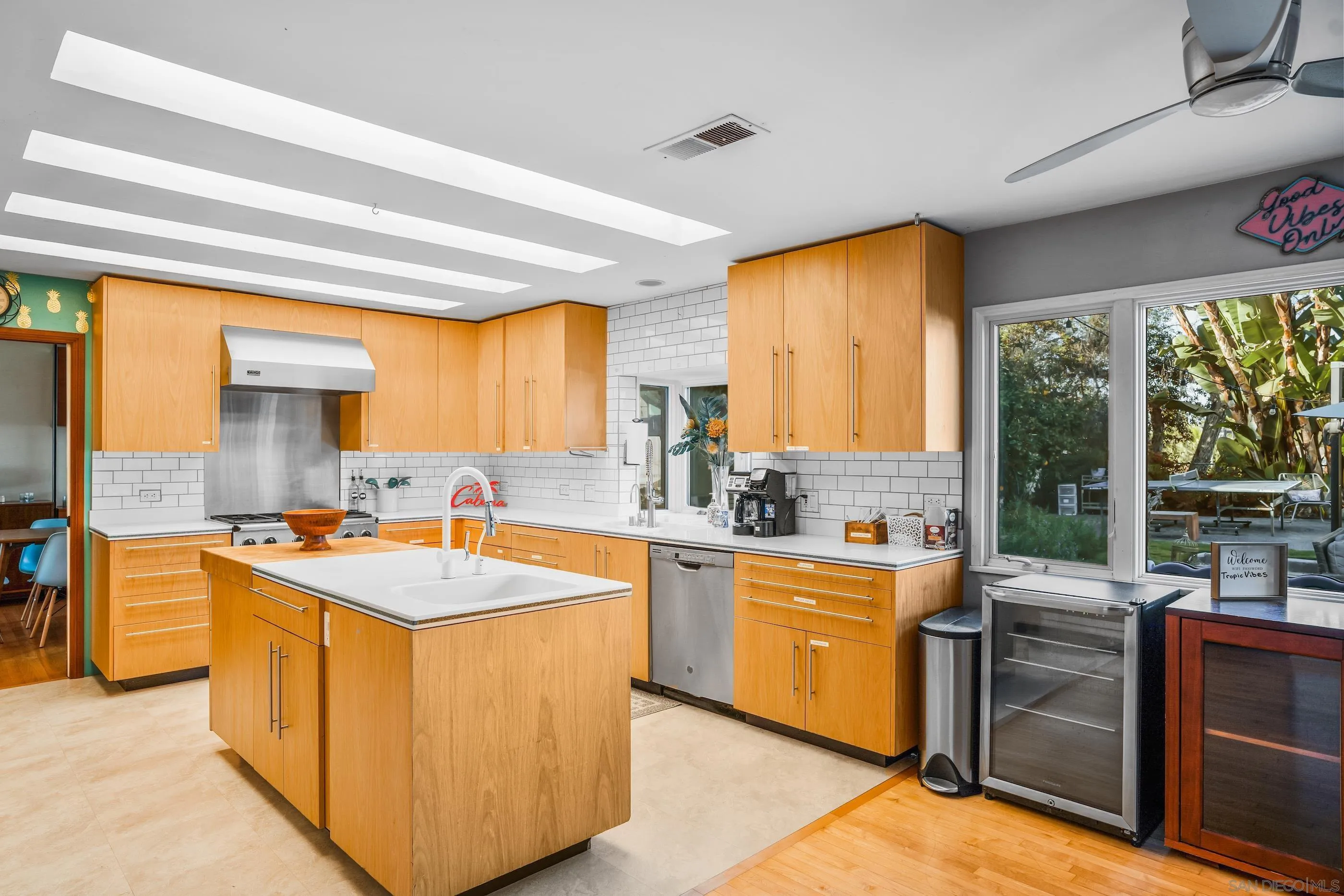 1530 Vanessa Circle Encinitas, CA 92024 - Photo 14 of 45 a kitchen with stainless steel appliances granite countertop a stove a sink and a refrigerator