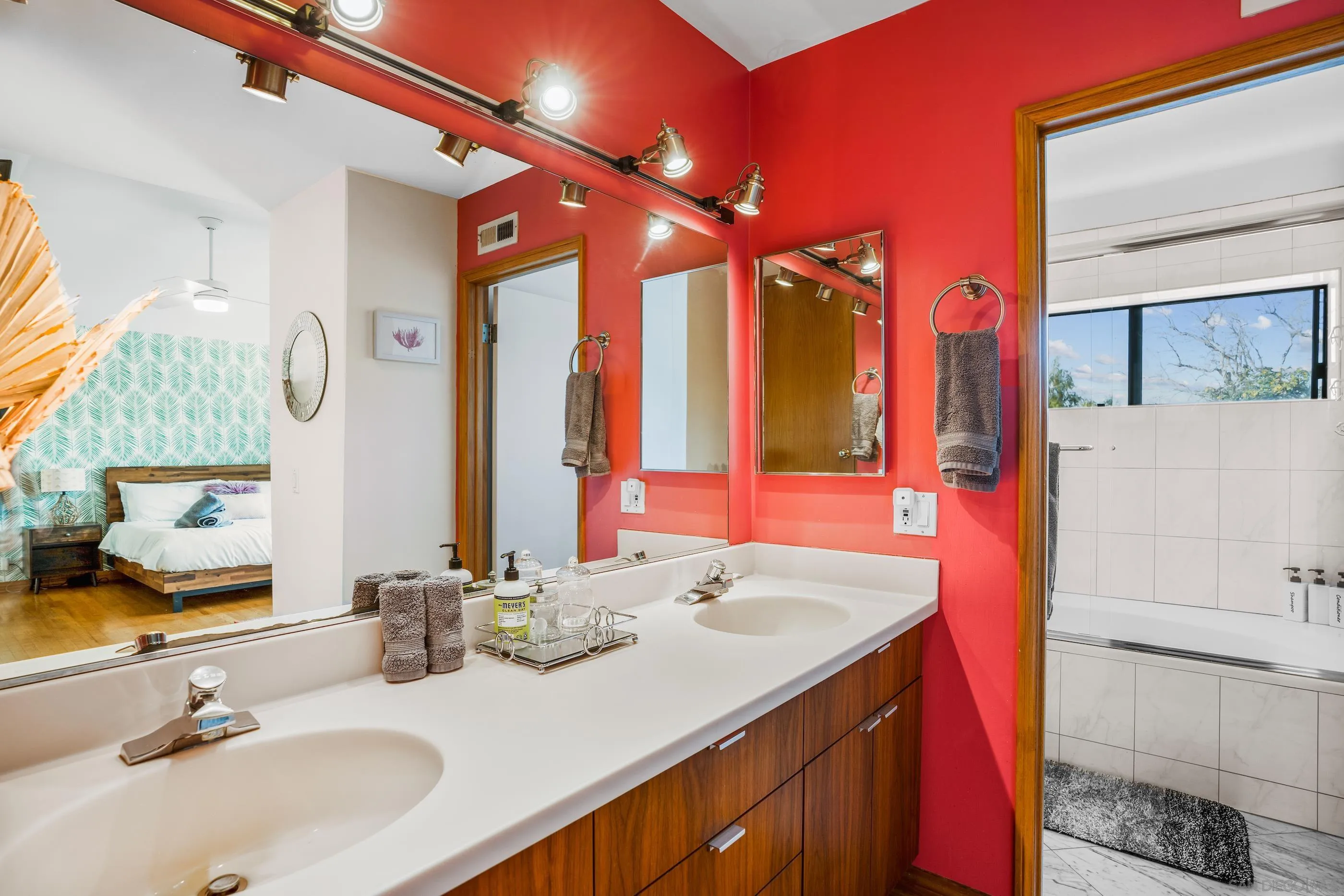 1530 Vanessa Circle Encinitas, CA 92024 - Photo 21 of 45 a bathroom with a sink and a mirror