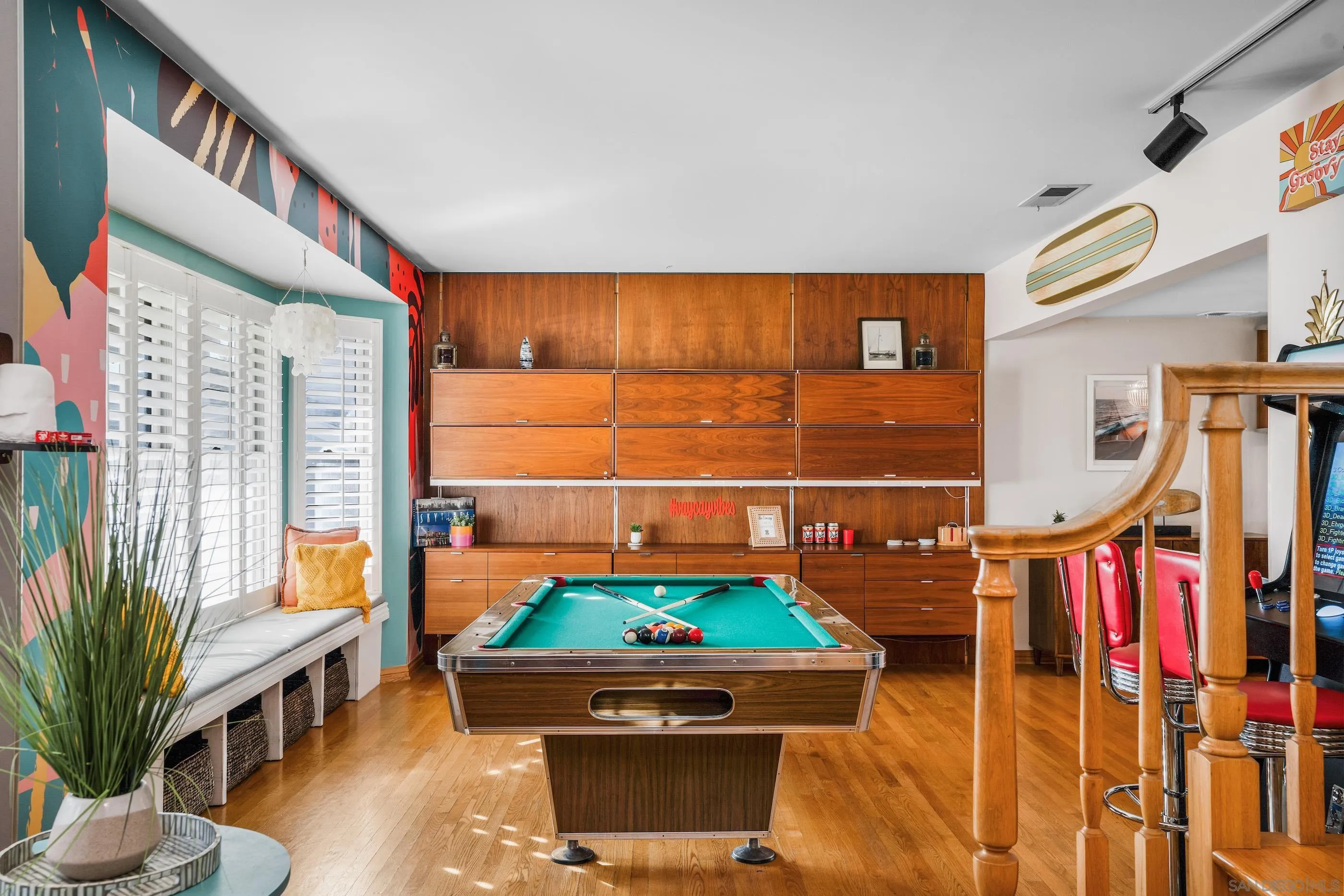 1530 Vanessa Circle Encinitas, CA 92024 - Photo 9 of 45 a room with lots of books and lots of furniture