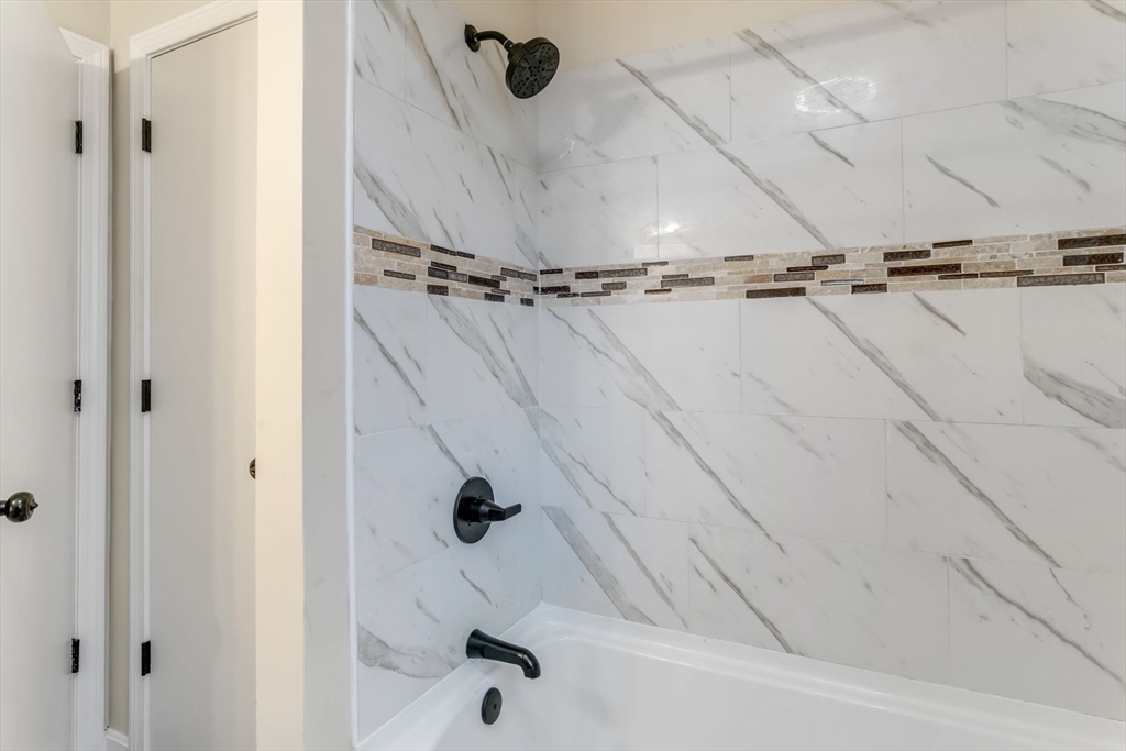 115 Carroll Street Springfield, MA 01108 - Photo 20 of 25 a bathroom with a shower