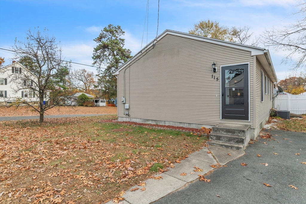 115 Carroll Street Springfield, MA 01108 - Photo 3 of 25 a view of backyard of house