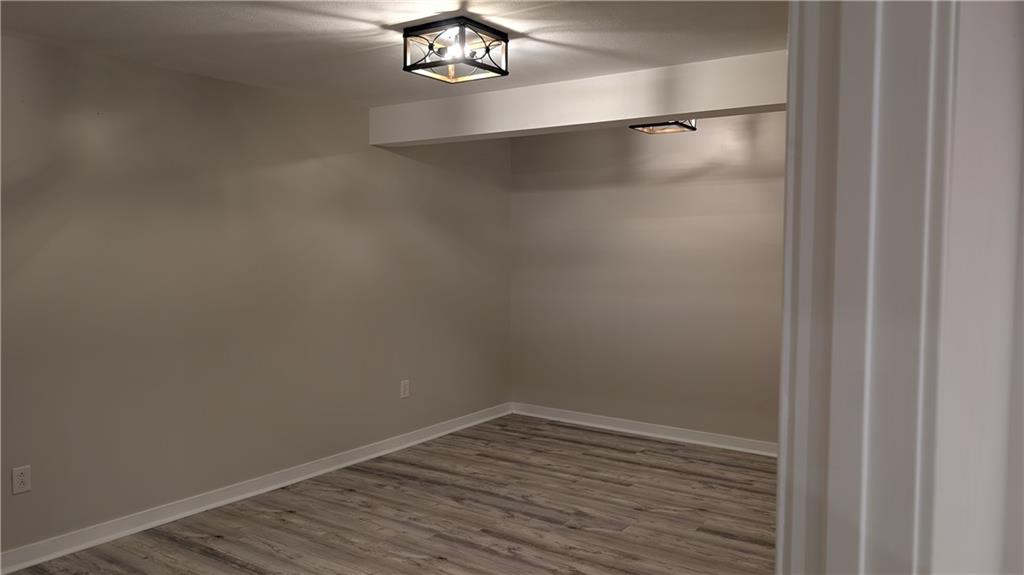 170 High Pointe Drive Washington, PA 15301 - Photo 24 of 29 a view of an empty room with wooden floor