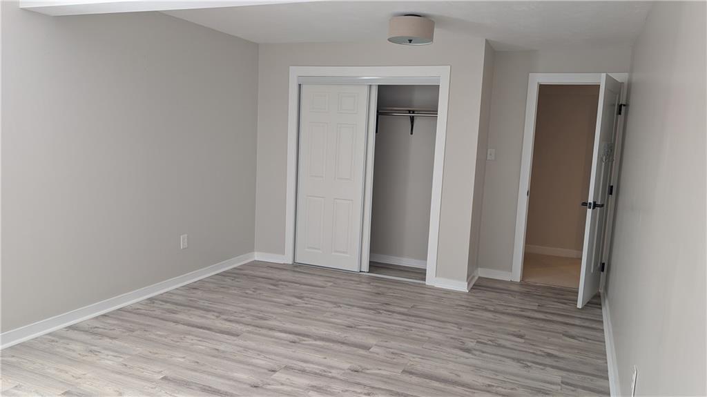 170 High Pointe Drive Washington, PA 15301 - Photo 27 of 29 an empty room with wooden floor and closet
