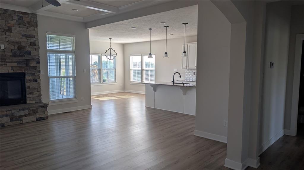 170 High Pointe Drive Washington, PA 15301 - Photo 6 of 29 a view of a hallway with wooden floor and a living room