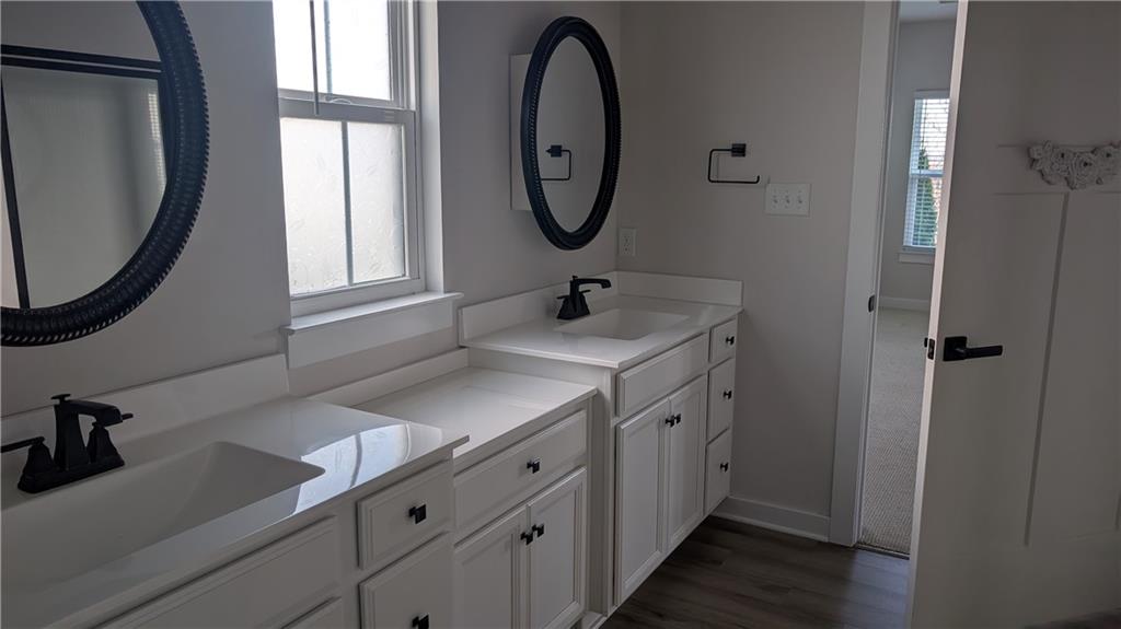 170 High Pointe Drive Washington, PA 15301 - Photo 9 of 29 a bathroom with a double vanity sink and a mirror