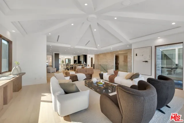 a bedroom with a bed and a fireplace