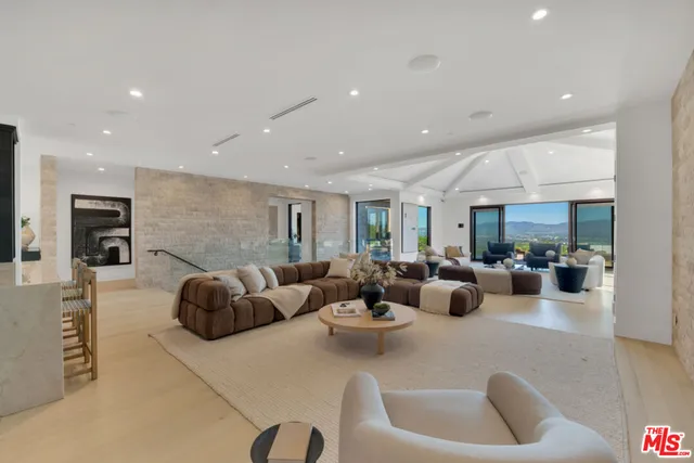 a bathroom with a shower and a sink